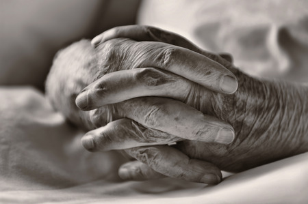 Hands of an elderly manの写真素材