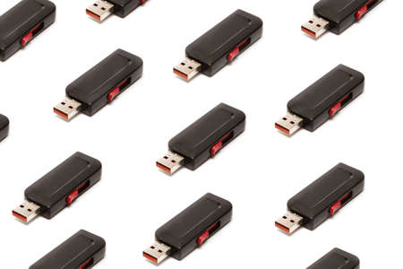 black USB flash drive on a white backgroundの写真素材