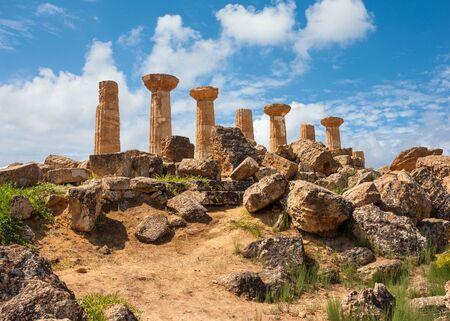 Ercole temple with dramatic sky in the Valley of the Temples, Agrigento, Sicily island, Italyの写真素材