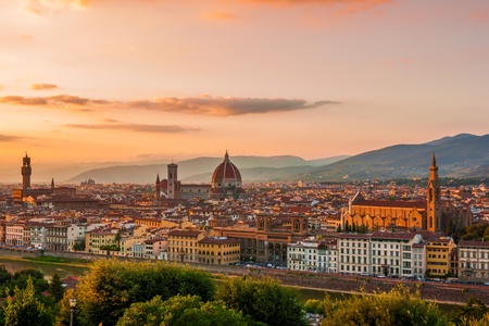 Golden sunset over Palazzo Vecchio, Cathedral of Santa Maria del Fiore (Duomo) and basilica of Santa Maria Novella, Florence, Italyの写真素材