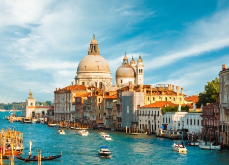 Gorgeous view of the Grand Canal and Basilica Santa Maria della Salute during sunset with interesting clouds, Venice, Italyの写真素材