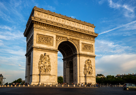 Arch of Triumph (Arc de Triomphe) with dramatic sky, Paris, Franceの写真素材