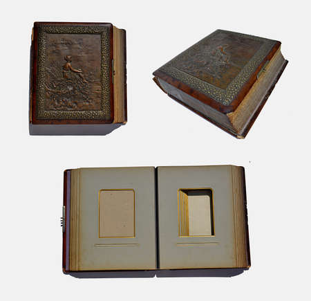 leather, old book with the engraving on the cover isolated on white backgroundの写真素材