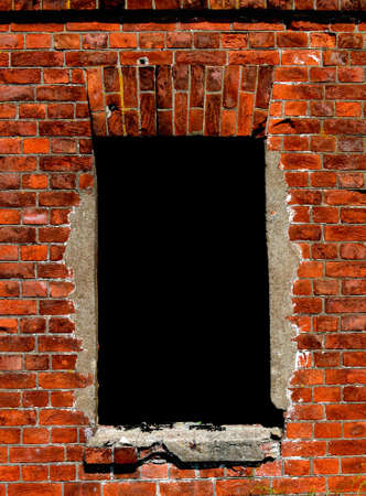 insulated window opening in an old brick wallの写真素材