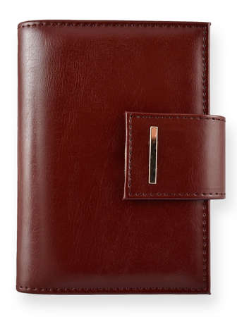 Brown leather notebook isolated on whiteの写真素材