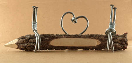 two nails symbolizing loveの写真素材