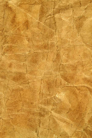 texture of crumpled, dirty, brown paperの写真素材