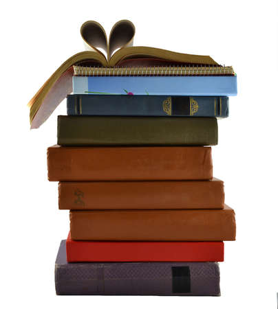 a lot of old books stackedの写真素材