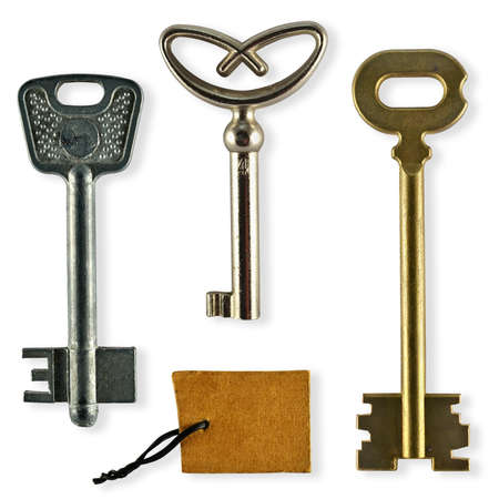 Collection of old keys isolated on a white backgroundの写真素材