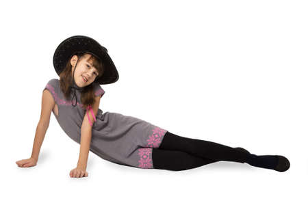 teen girl in a cowboy hat isolated on white backgroundの写真素材