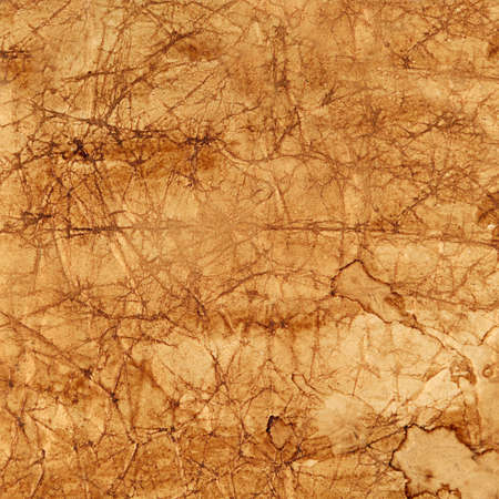texture of crumpled, dirty, brown paperの写真素材