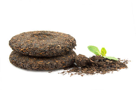 the Chinese fermented Puer tea isolated on white backgroundの写真素材