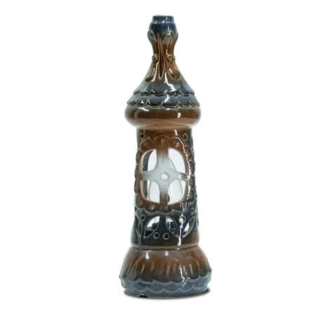 bottle shaped ceramic lamp isolated on white backgroundの写真素材