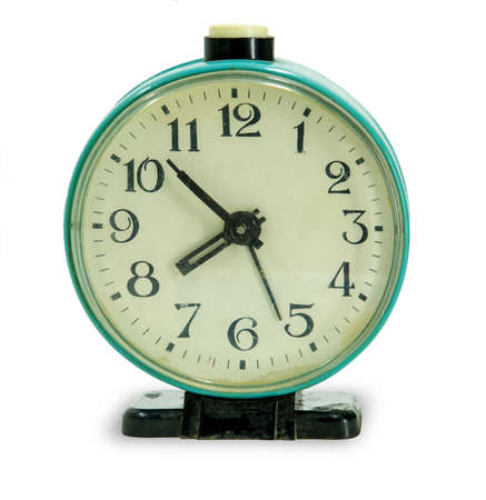 green vintage alarm clock isolated on white backgroundの写真素材