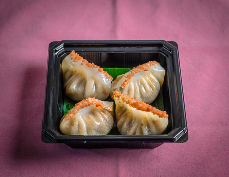 dim sum on a wooden tableの写真素材