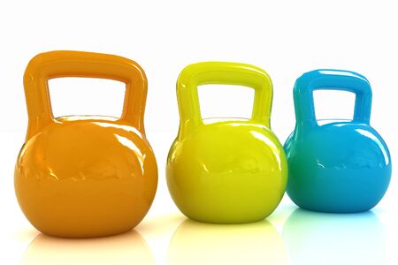 Colorful weights on a white backgroundの写真素材