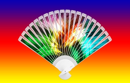 Colorful hand fan on a white backgroundの写真素材