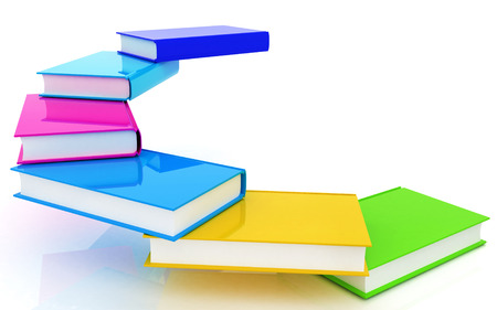 colorful real books on a white backgroundの写真素材