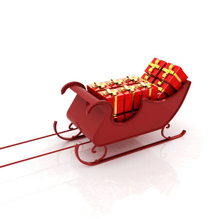 Christmas Santa sledge with gifts on a white background の写真素材