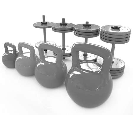 Colorful weights and dumbbells on a white backgroundの写真素材