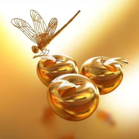 Dragonfly on gold applesの写真素材