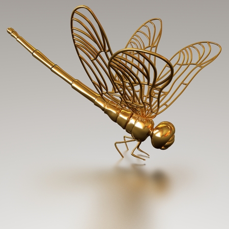 Gold dragonfly on a metall backgroundの写真素材