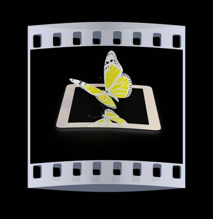 butterflies on a phone on a black background. The film stripの写真素材