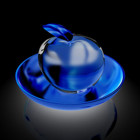 Glass apple on a plateの写真素材