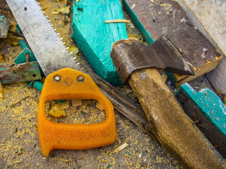 Building tools: Ax and saw - close-upの写真素材
