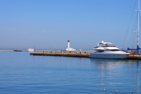 Motor boat over harbor pier, Odessa, Ukraineの写真素材