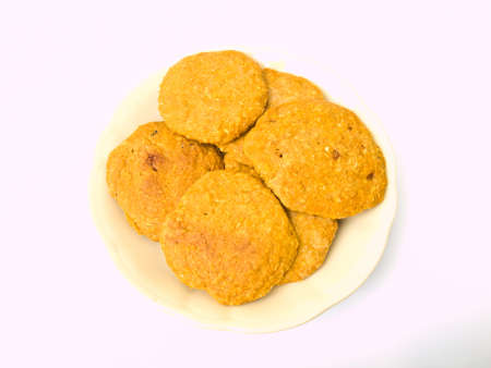 Pile of cookies on a Chiness porcelane plateの写真素材