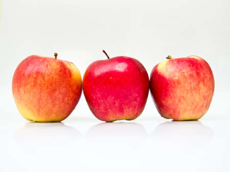 Line of Red applesの写真素材