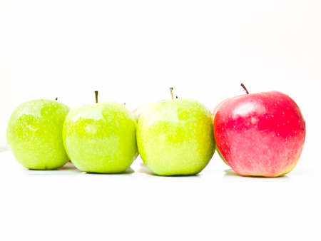 Green and red applesの写真素材