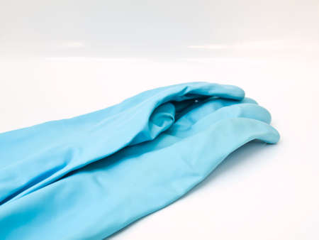 Two light blue rubber glovesの写真素材