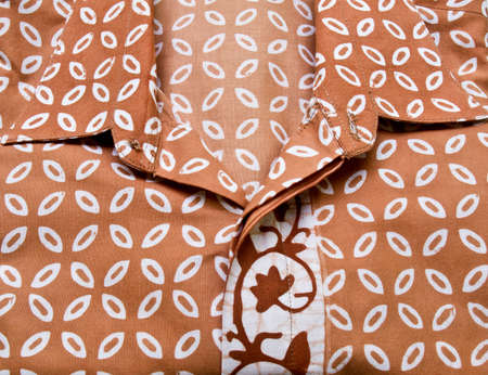 Brown batik with the repettition pattern shirt from Yogyakarta, Indonesiaの写真素材