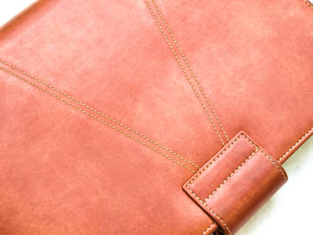 Red brown leather organize cover as backgroundの写真素材