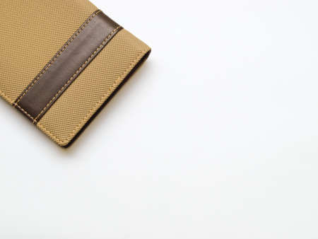 Light brown notebook cover isolated on white backgroundの写真素材