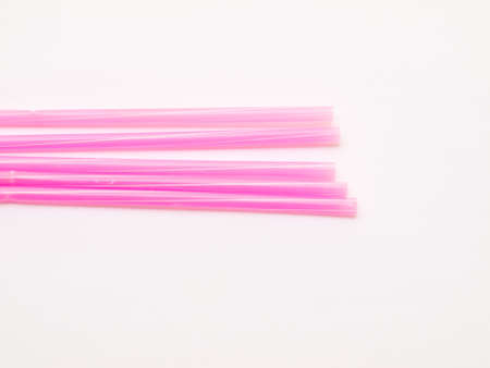 Pink  straws isolated on white backgroundの写真素材