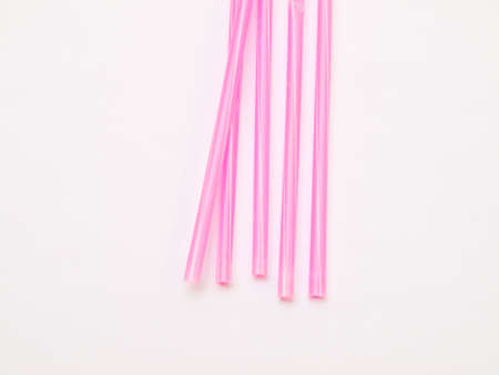 Pink  straws isolated on white backgroundの写真素材
