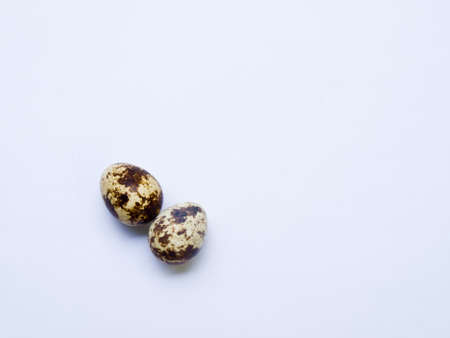 Quail eggs isolated on white backgroundの写真素材