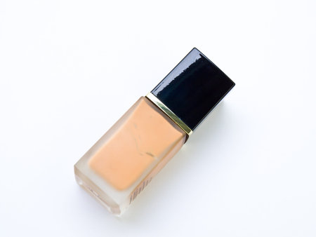 Bottle of cosmetic liquid foundation on white background の写真素材