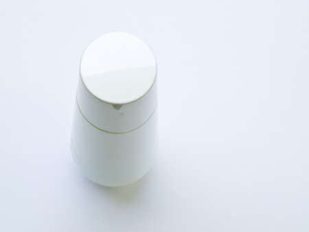 A white plastic bottle isolated on white backgroundの写真素材
