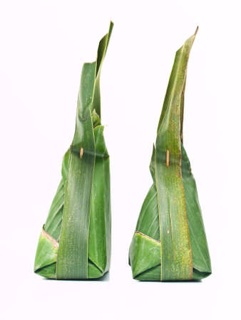 Thai dessert packages made from banana leavesの写真素材