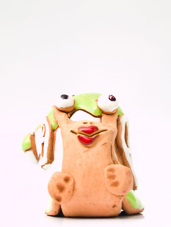 An escargot ceramic doll isolated on white backgroundの写真素材