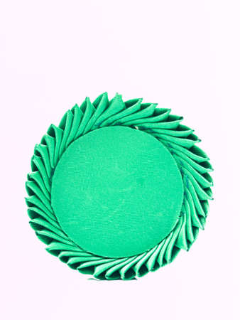 A miniature of Thai traditional tray made from green silk isolated on white backgroundの写真素材