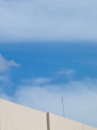 White wall and blue skyの写真素材