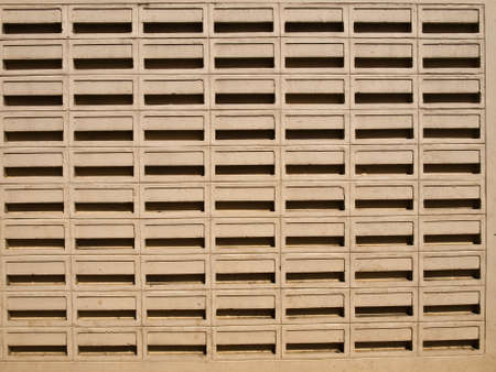 Ventilated white wall as backgroundの写真素材