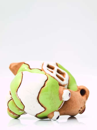 An escargot ceramic doll isolated on white backgroundの写真素材