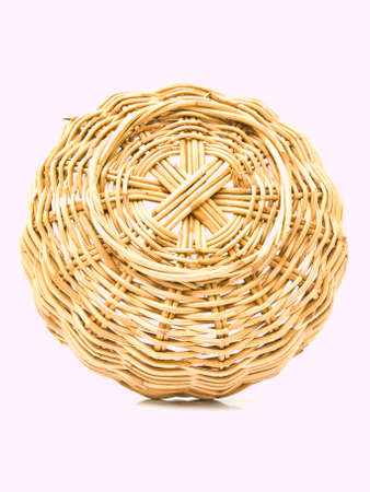 Ratten wicker basket isolated on whiteの写真素材