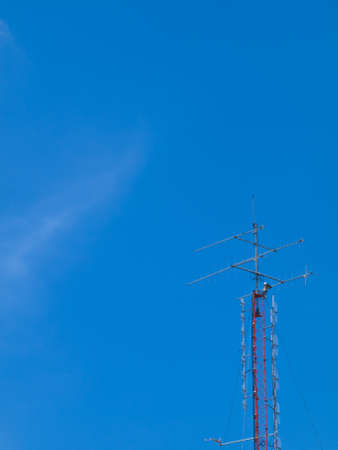 antena tower on blue  sky backgroundの写真素材